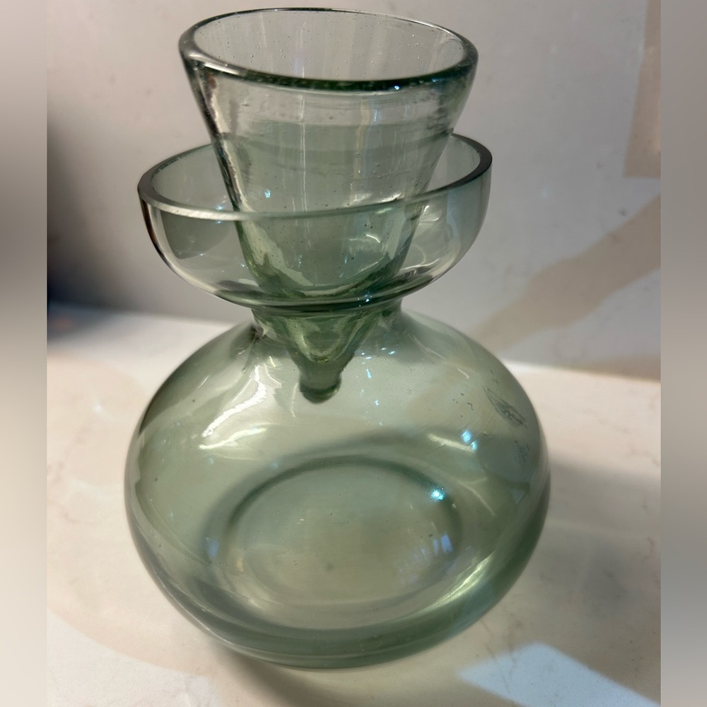 Unique green glass decanter with drinking cup stopper 5 inches tall.